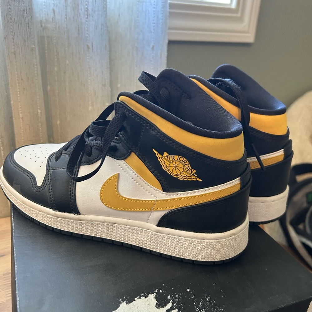 Nike Air Jordan 1 Mid Black and Yellow Sneakers